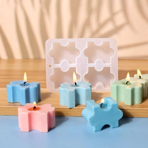 Stampo in silicone a forma di puzzle per candele e resina con campioni colorati