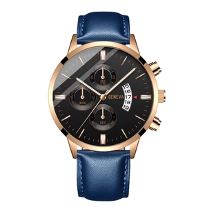 Detail view of business quartz watch dial with luminous calendar and blue leather strap