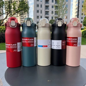 Five 1700ml stainless steel insulated flasks in diverse colors on outdoor table