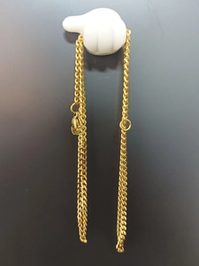 Detail of 3mm gold-plated stainless steel wheat chain with durable lobster clasp closure