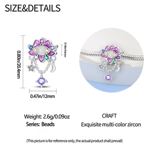 Detail of 925 silver lotus charm with colorful zircons and moon star dangle on snake chain