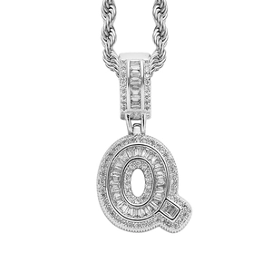 Close-up of hip-hop silver Q-letter pendant with ice zircons on a twisted rope chain