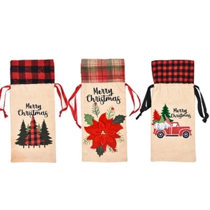 Three Merry Christmas wine bottle gift bags with plaid patterns and festive graphics