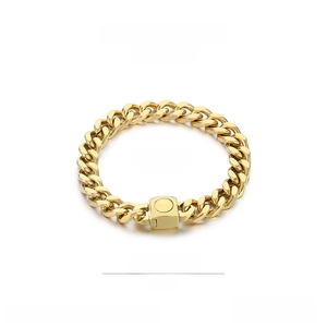 Detail showing 9mm golden stainless steel Cuban chain link bracelet with polished buckle