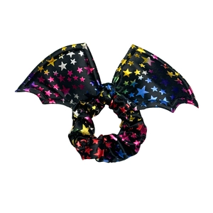 Halloween bat wing scrunchie with rainbow star pattern on black fabric for women