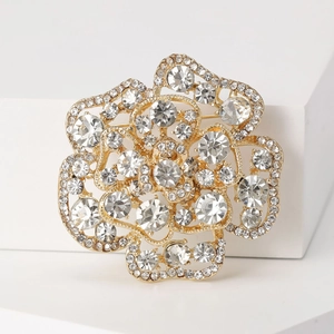 Elegant gold rose brooch with sparkling crystals and hollowed design for women