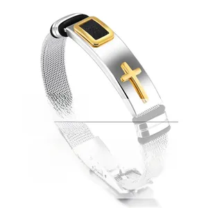 Detail shot of men's stainless steel mesh bracelet with golden cross and black plate