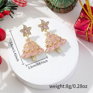Detailed view of pink Christmas tree earrings with star stud and dimension markers