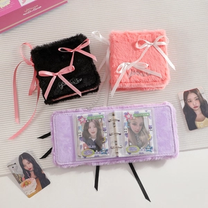 Plush 3-inch photo album set in black, pink, and purple with ribbon bows and binder rings