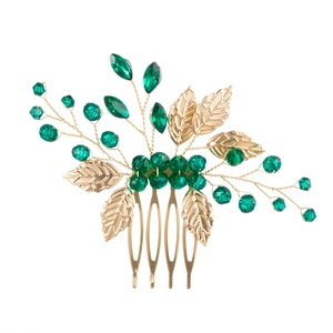 Handmade gold leaf hair comb with green crystal beads for elegant bridal hair styling