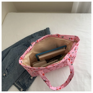 Top view of pink cherry print tote bag interior showing large capacity and beige lining