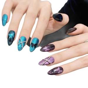 Blue and purple cat-eye press-on nails with butterfly motifs and silver metal chains