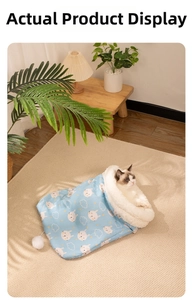 Plush blue pet sleeping bag with bunny print and thick warm faux sheepskin opening
