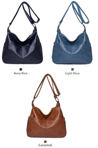 Detailed comparison of navy, blue and caramel vintage washed leather crossbody bags