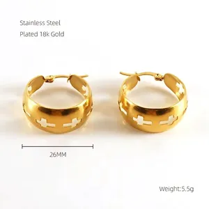 Detail of 26mm gold plated stainless steel hoop earrings with hollow cross patterns