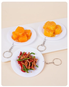 Three realistic miniature food keychains with green pepper meat and dessert models