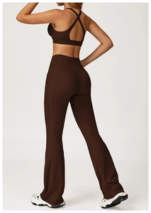 Detail of dark brown yoga set featuring racerback sports bra and flared leggings with pockets