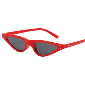 Retro cat-eye sunglasses with red frame and dark lenses featuring stylish rivet details