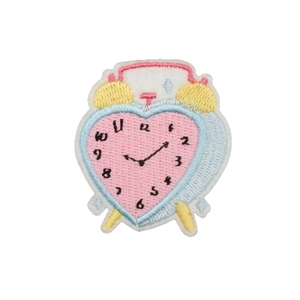 Cute heart-shaped alarm clock embroidery patch with colorful threads on white background