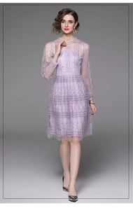 Close-up of purple lace embroidery and pearl collar detail on the mesh midi dress