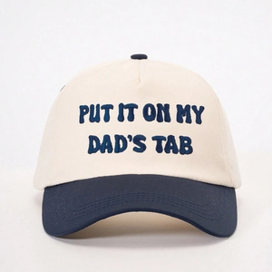 Two-tone cotton baseball cap in cream and navy blue with Put It On My Dads Tab embroidery