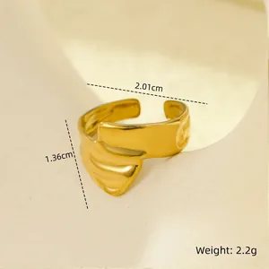 Macro detail showing dimensions of a 18K gold plated stainless steel wave ring