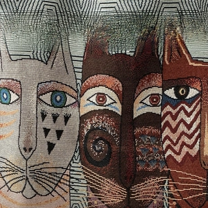 Close-up of durable jacquard canvas fabric featuring abstract cat patterns and rich texture