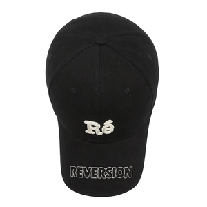 Classic black cotton baseball cap with white Ré and REVERSION embroidery on the front