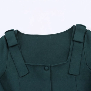 Dark green knitted top with elegant square neckline and shoulder bow strap detail