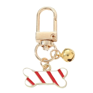 Zinc alloy Christmas dog keychain featuring a gold bell and red striped bone charm
