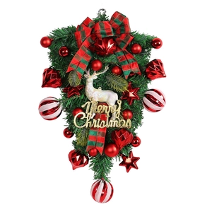 Christmas hanging elk decoration with pine needles, red berries, and Merry Christmas sign
