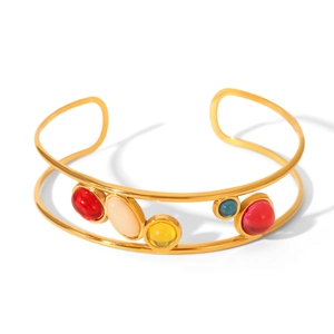 Detailed shot of double-layer gold open bangle with colorful natural stone inlays
