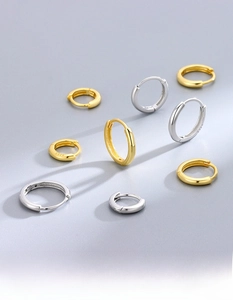 Detailed view of S925 sterling silver hoop earrings with thick plating and polished finish