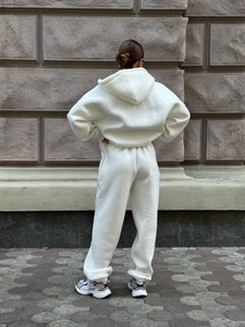 Two-piece cream white hooded tracksuit set with oversized fit and high waist joggers