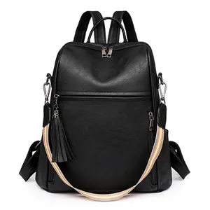 Black PU leather women backpack with striped shoulder strap and decorative fringe tassel