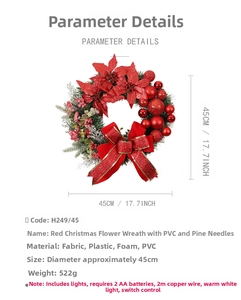 Detail of 45cm red Christmas wreath with LED lights, baubles and festive bow decoration