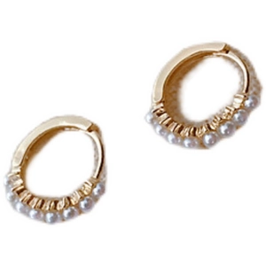Elegant gold hoop earrings with white micro pearls for women on white background
