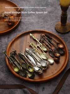 Detailed view of vintage royal style coffee spoons with crystal beads on wooden tray