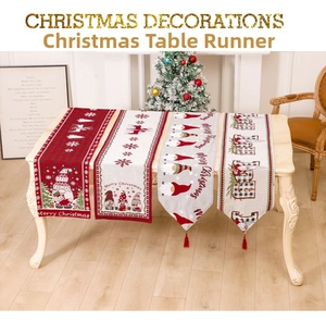 Detail of four festive Christmas gnome table runners with snowflakes and red tassels