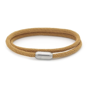 Close-up of khaki woven double-layer rope bracelet with brushed silver magnetic clasp