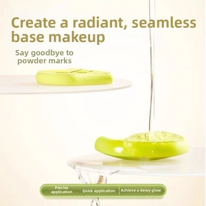 Light green makeup sponge expanding in water for a seamless foundation application