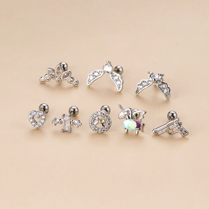 Set of 8 stainless steel cartilage earrings featuring heart, crown and wing designs