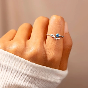 Minimalist S925 sterling silver evil eye open ring featuring blue gemstone and wavy band