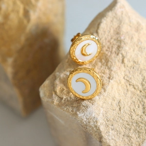 French luxury gold moon stud earrings with white shell inlay on natural stone