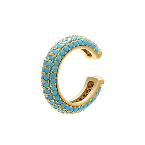 Detail of gold-plated C-shaped ear cuff with pave-set vibrant blue beads decoration