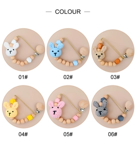 Detailed grid of six crochet rabbit pacifier clips with natural wooden beads in soft colors