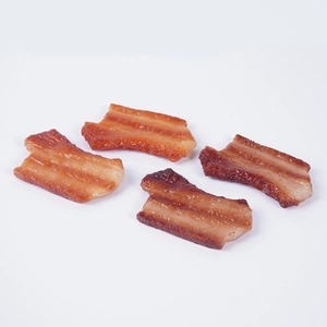 Set of four realistic PVC artificial cooked pork belly models for food props and keychains