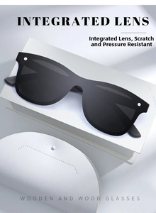 Close-up of black oversized polarized sunglasses with a white leather protective case