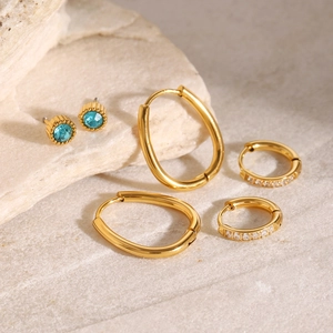 Three-set gold stainless steel earrings with blue gemstones and clear zircon accents