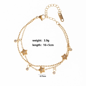 Detailed view of dual-layer gold star bracelet with cubic zirconia and K18 hallmark tag